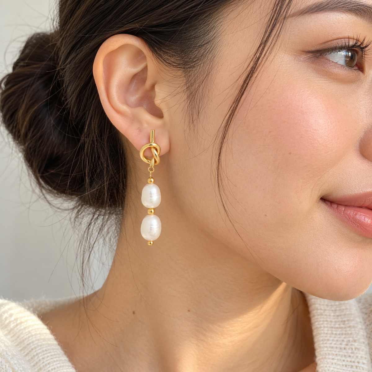 Love Knot Pearl Drops worn by a model